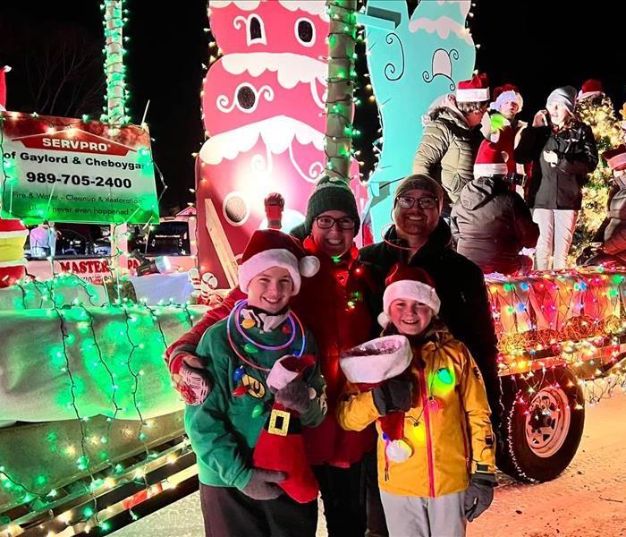 Pictured is our SERVPRO staff in front of our float for the Cheboygan Parade of Lights.