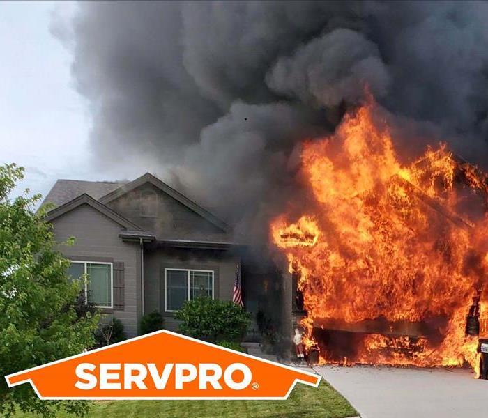 Pictured above is a house that has caught fire with the servpro logo.